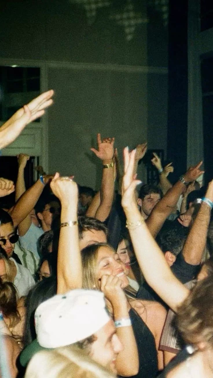 Friends dancing together at a party